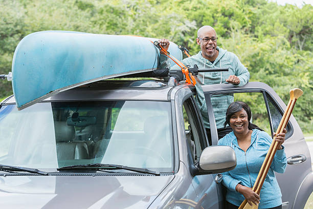 istock Mature couple preparing to go canoeing 512628874