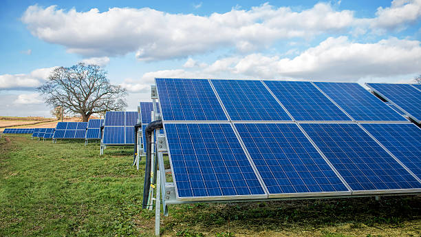 istock Solar Farm. Green Fields Blue Sky, Sustainable Renewable Energy. 512629674