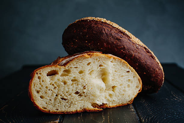 istock Two loafs of bread lying on a table 512632826
