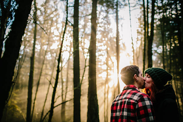 istock Couple kissing in the forest 512633768