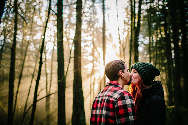 istock Couple kissing in the forest 512633792
