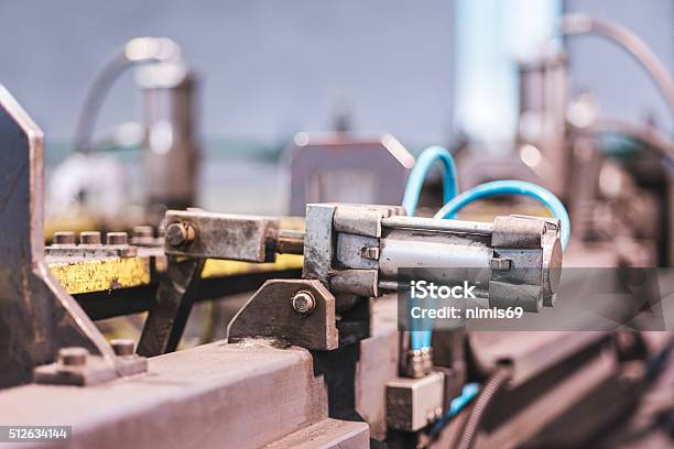 Hydraulic Piston On Factory Machine Stock Photo - Download Image Now - Hydraulic Platform, Cylinder, Manufacturing