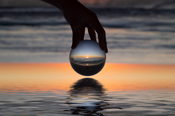 Crystal Ball Reflection of a Beach Shot at Golden Bay, Western Australia. crystal ball photos stock pictures, royalty-free photos & images
