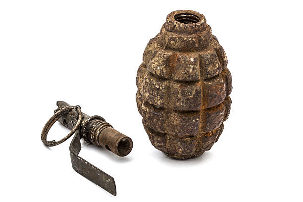 istock Old grenade and fuse, isolated on white background 512636900
