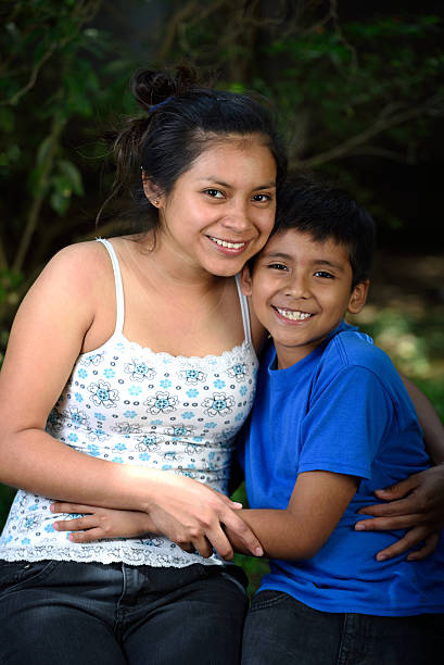 istock boy and girl hugging 512682412