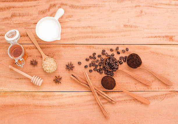 istock Cup of coffee with milk honey on wooden table 512683944