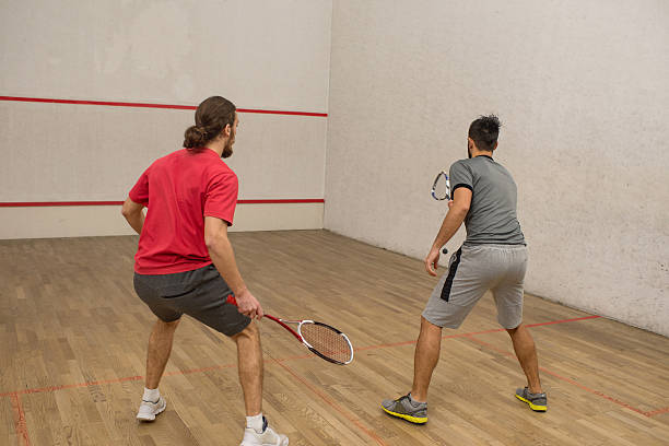 istock Young athletes competing in racketball game. 512685822
