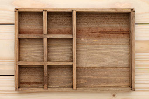 Empty wooden box on wood background