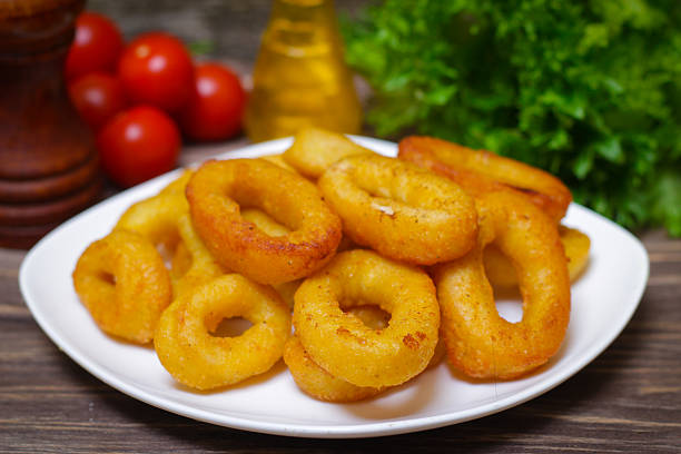istock deep fried calamari with sauce and salad 512686230