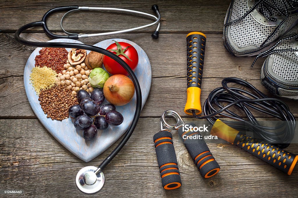 Healthy lifestyle concept with diet and fitness Healthy lifestyle concept with diet and fitness on wooden boards Healthy Eating Stock Photo