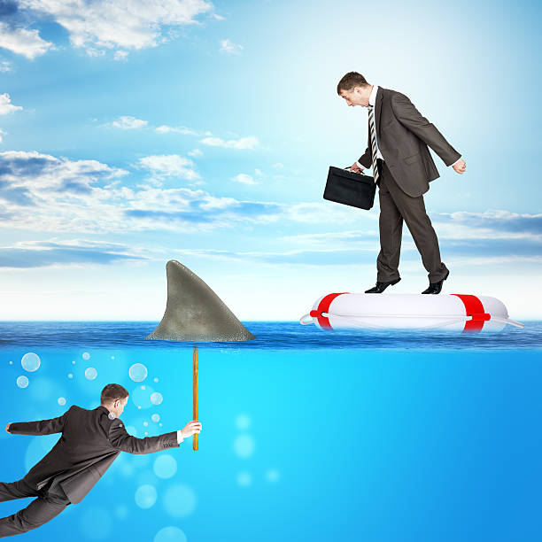istock Buisnessman on lifebuoy 512691448