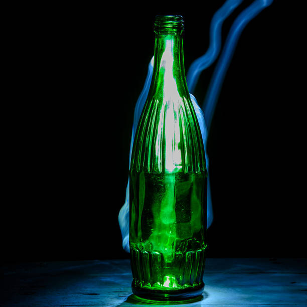 istock close up green glass bottle 512692128