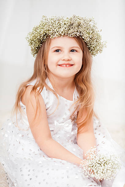 istock Cute little girl with a wreath 512693552