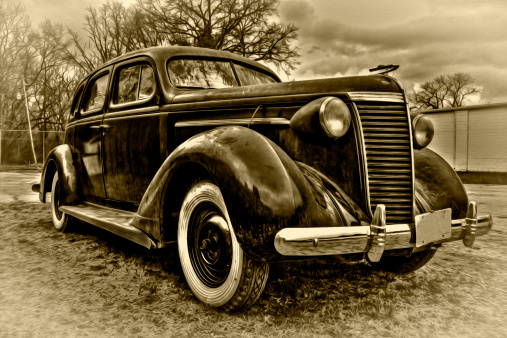A 1937 vintage car in original condition.  This one is processed as an sepia tone for effect.