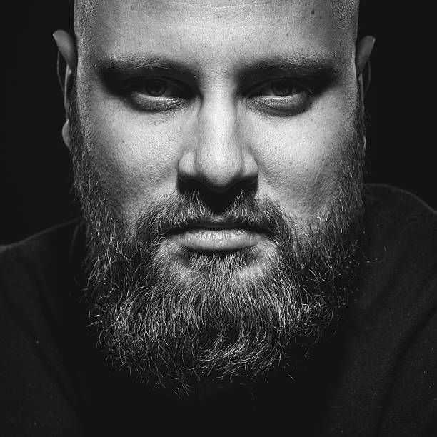 istock Portrait of brutal man with a beard 512695524