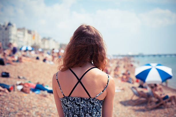 istock Young woman on the beach 512695803