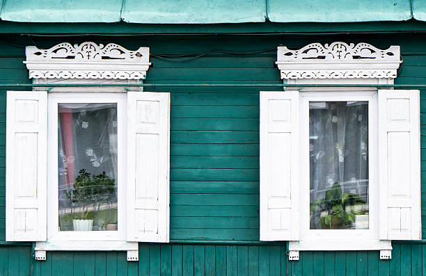 istock Wooden window with shutter doors. 512695845