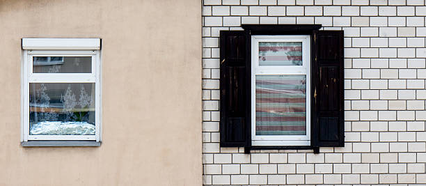istock Wooden window with shutter doors. 512697137