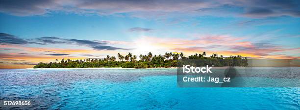 Beautiful Nonsettled Tropical Island In Sunset Stock Photo - Download Image Now - Island, Tropical Climate, Caribbean Sea