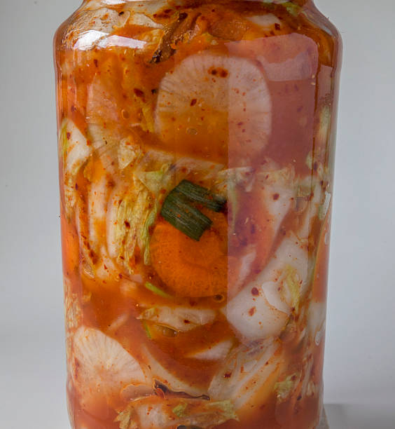 istock Kimchi in glass bottle 512699090