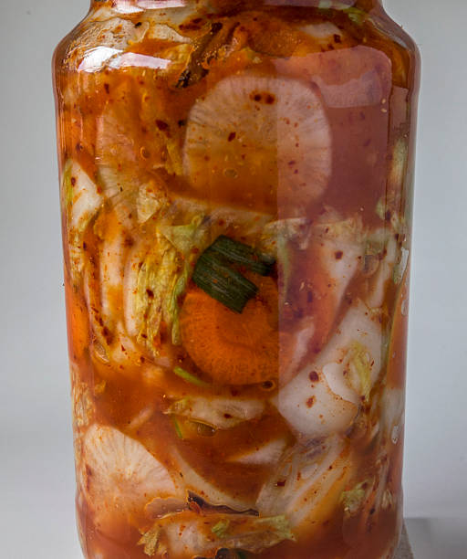 istock Kimchi in glass bottle 512699116