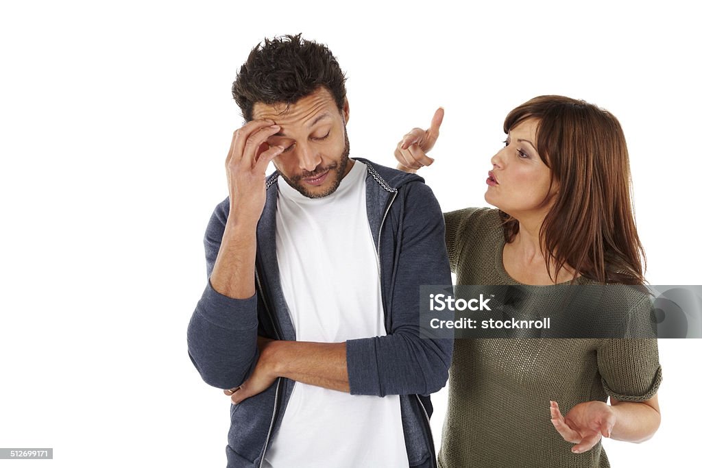 Mixed raced couple having relationship difficulties Portrait of mixed raced couple having relationship difficulties against white background Men Stock Photo