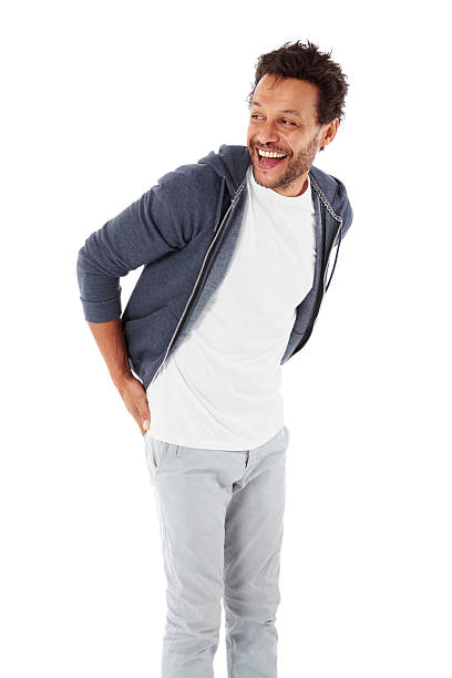 istock Mature man in casuals looking away laughing 512699175