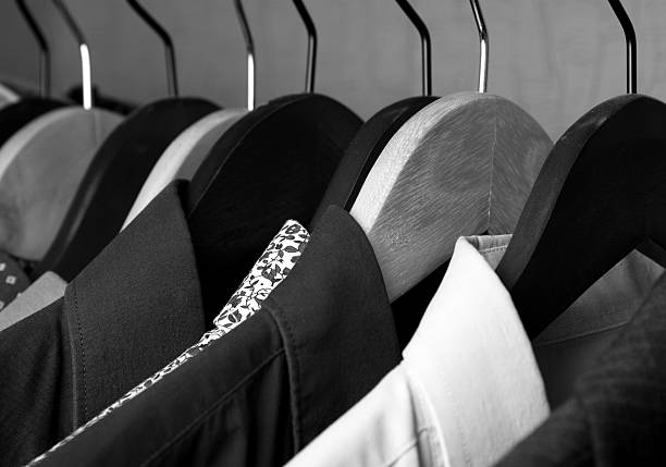 istock shirts and jackets in wardrobe isolated closeup 512700308