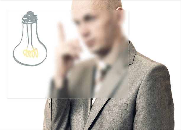 istock Business idea concept. Light bulb on office desk 512701070