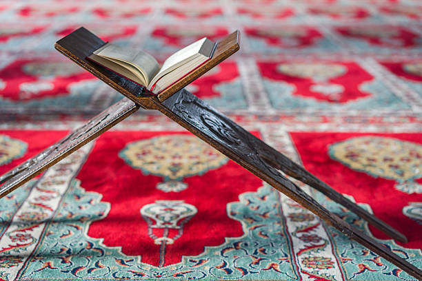 istock Koran standing on a stand in the mosque 512701976
