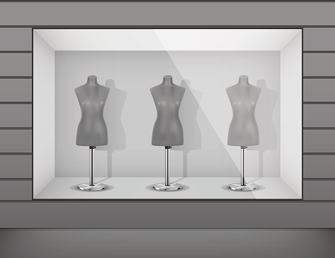 Boutique display window with mannequins