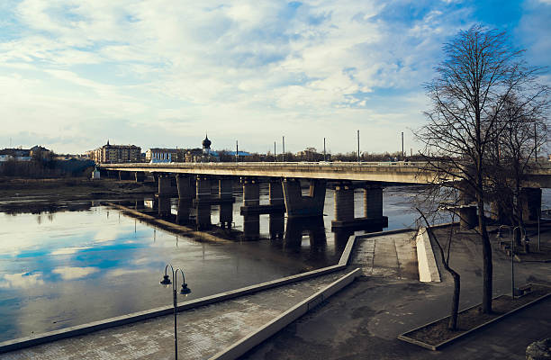 istock Pskov, bridge over the Velikaya river, mirroring  sky 512702632