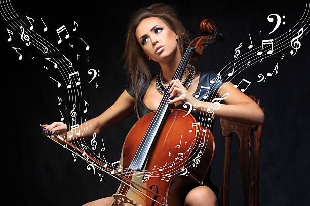 istock Pretty young female musician playing the cello 512726180