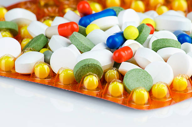 istock Heap of medicine pills 512727046