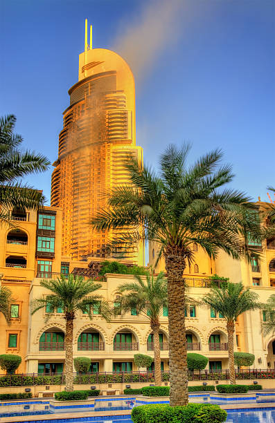Dubai, UAE - January 1, 2016: View of the Address Downtown Hotel on fire. The tower burned down on the New Year's night