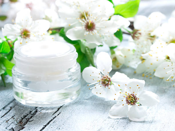istock natural facial cream with spring flowers 512730664
