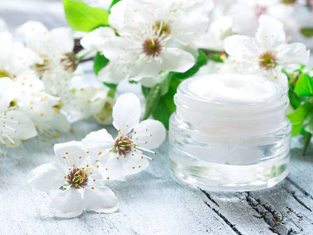 istock natural facial cream with spring flowers 512731502