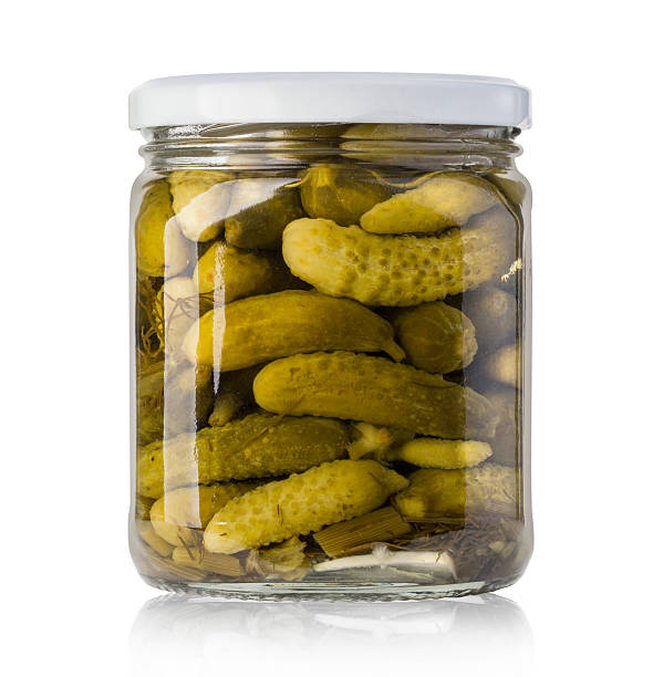 istock Pickled cucumbers in glass jar 512732828