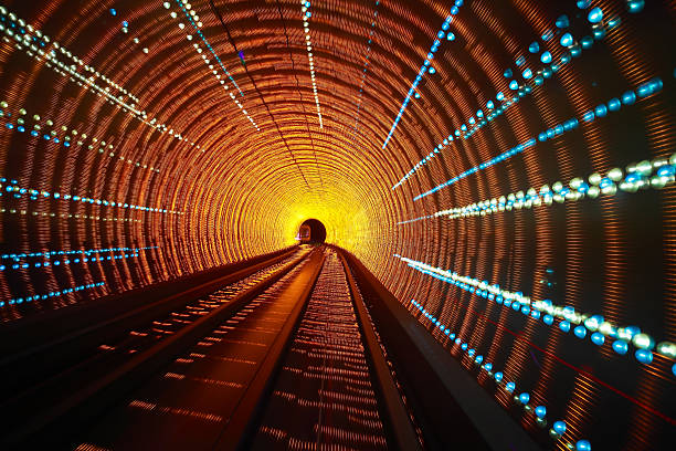 istock Through the long of lighting tunnel 512733266