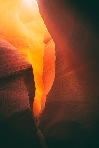 Sunlight shining down the narrow Lower Antelope Canyon outside Page, Arizona.