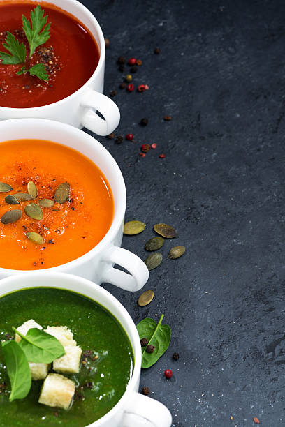 istock assortment of vegetable cream soup on and dark background 512735878