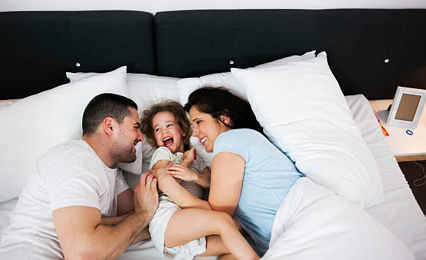 istock Family in bed 512737636