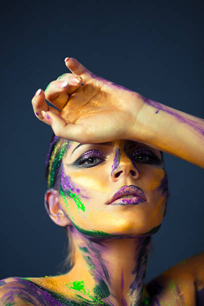 istock Woman body art on dark blue background 512739972