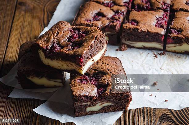 Raspberry Brownie On Wooden Background Stock Photo - Download Image Now - Brownie, Cheesecake, Baked