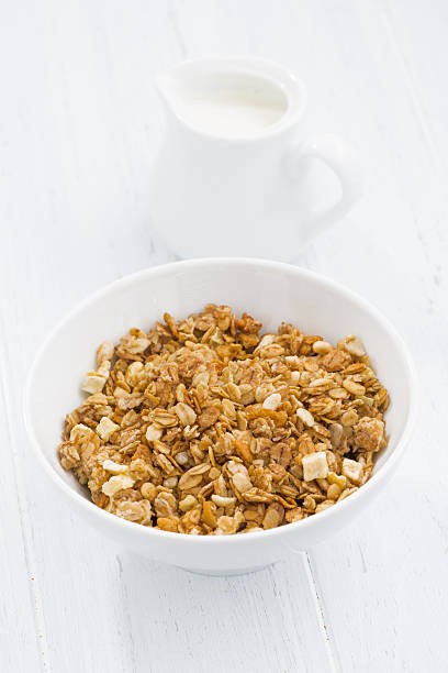 istock baked muesli in bowl and milk 512743408