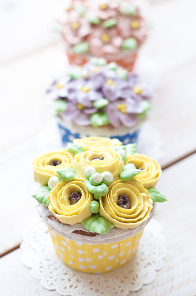 istock home made sponge cupcakes with flowers buttercream 512744306