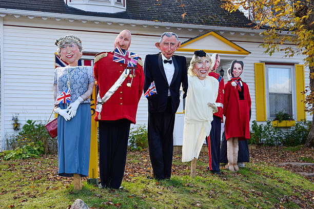 Scarecrow festival, Mahone Bay, Canada Mahone Bay, Canada - October 9, 2014: Figures (Royal Family) at the annual scarecrow festival. At this event figures, characters and scenes of different motives are placed in the streets all over the town. princess of wales stock pictures, royalty-free photos & images