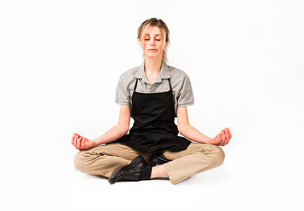 istock Employee in a uniform in a yoga pose 512746250