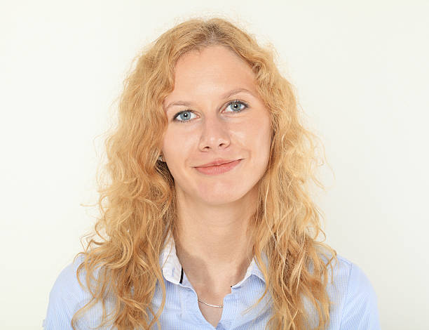 istock Young Woman Smiling Portrait. 512746291