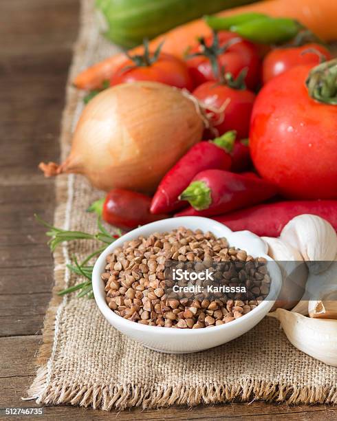 Raw Organic Buckwheat And Vegetables Stock Photo - Download Image Now - Biology, Bowl, Brown